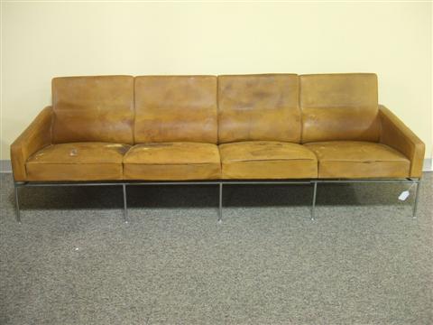 Appraisal: ARNE JACOBSEN STYLE STEEL AND LEATHER SOFA Mid th century