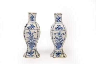 Appraisal: A pair of late th Century Delft vases decorated birds