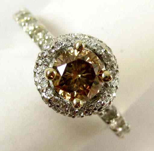 Appraisal: DIAMOND AND EIGHTEEN KARAT WHITE GOLD RING round-cut colorless diamonds