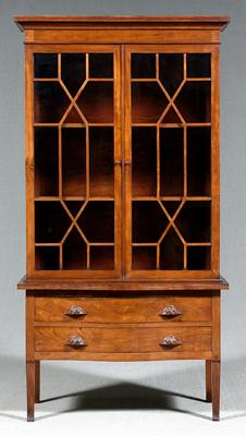 Appraisal: Cuban mahogany china cabinet Regency style serpentine front with scrolled