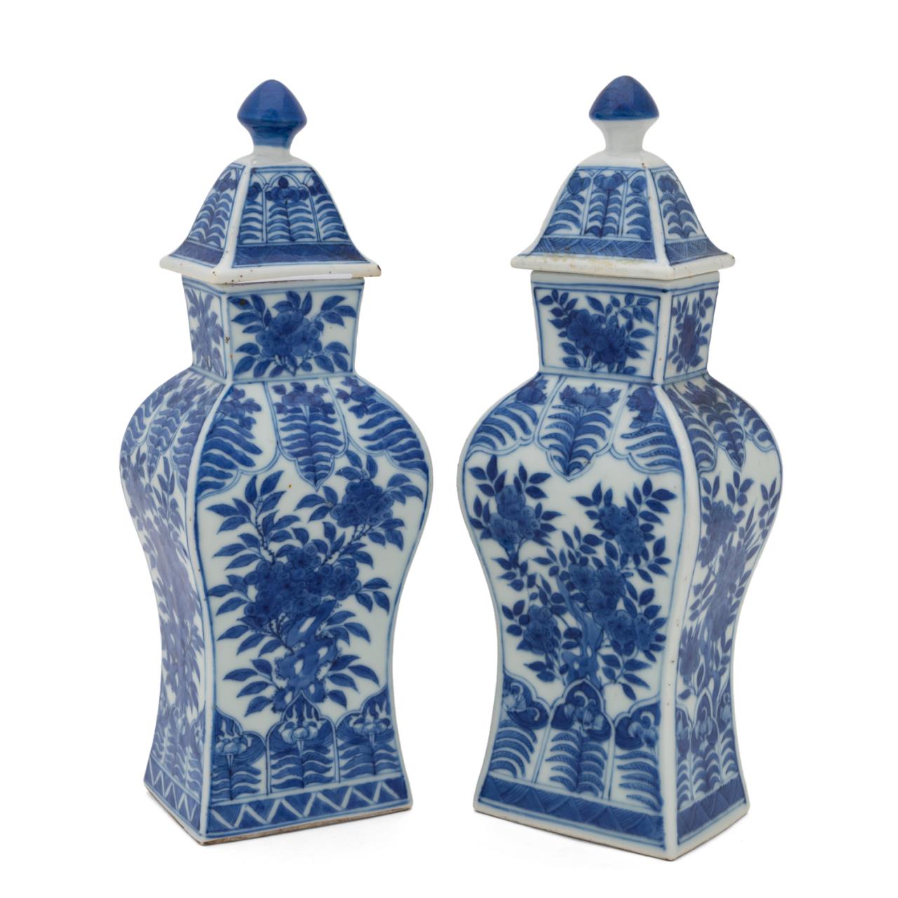 Appraisal: PAIR OF CHINESE BLUE AND WHITE LIDDED URNS Pair of