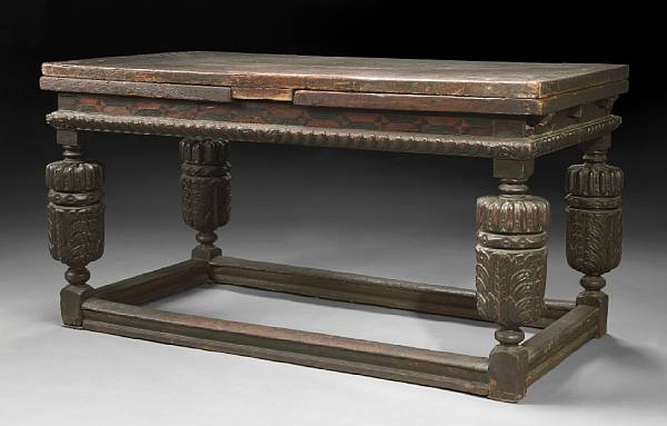 Appraisal: An Elizabethan style inlaid oak draw leaf refectory table incorporating