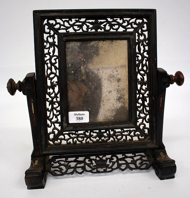 Appraisal: A TH CENTURY ORIENTAL CARVED HARDWOOD SWING MIRROR converted from