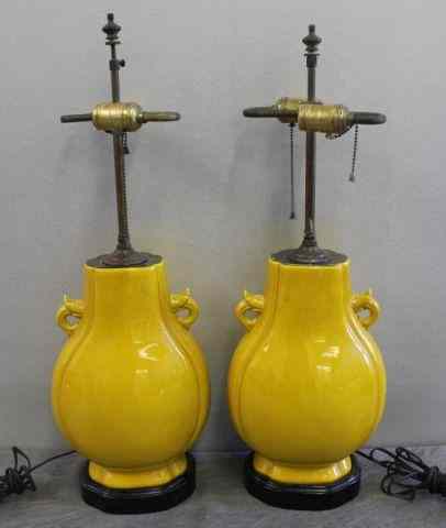 Appraisal: Pair of Vintage Yellow Chinese Ceramic Lamps On hardwood bases