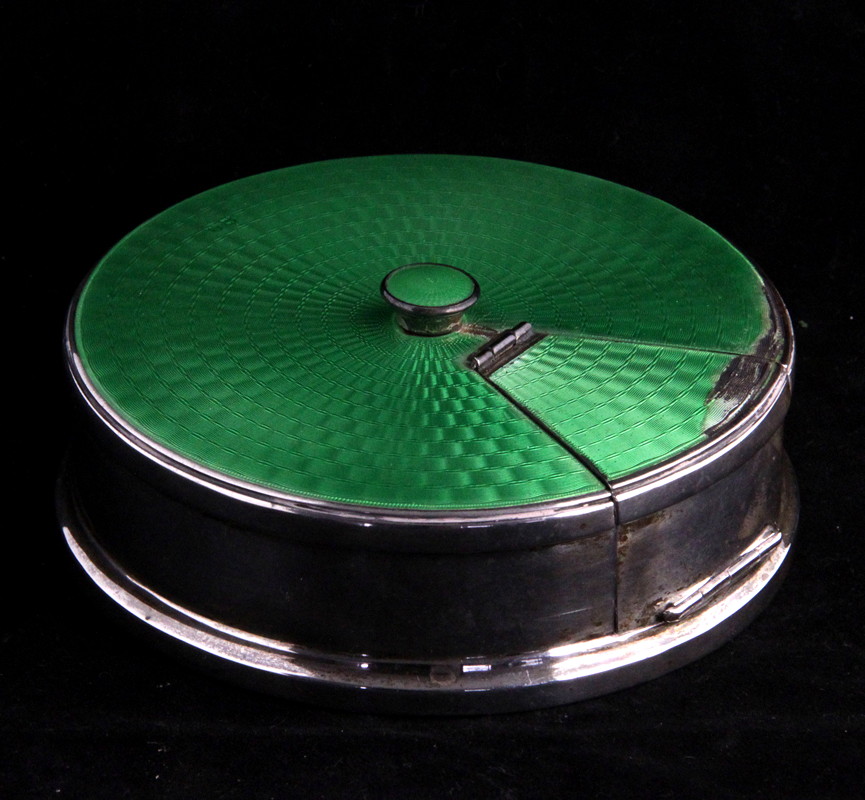 Appraisal: A silver and enamel cigarette dispenser Birmingham retailed by Asprey