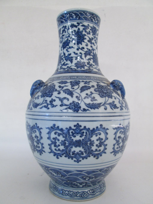 Appraisal: CHINESE BLUE UNDERGLAZE PORCELAIN VASE a standard bottle-form vase with