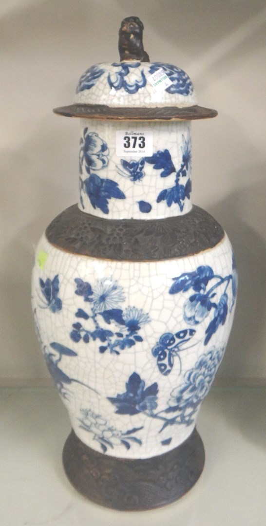 Appraisal: A Chinese crackle glazed blue and white baluster vase and