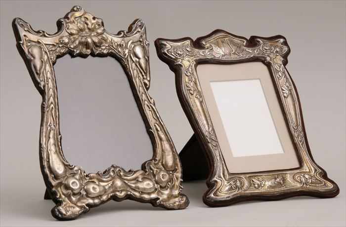 Appraisal: TWO ENGLISH ART NOUVEAU SILVER-ON-VELVET PICTURE FRAMES Marked Birmingham the