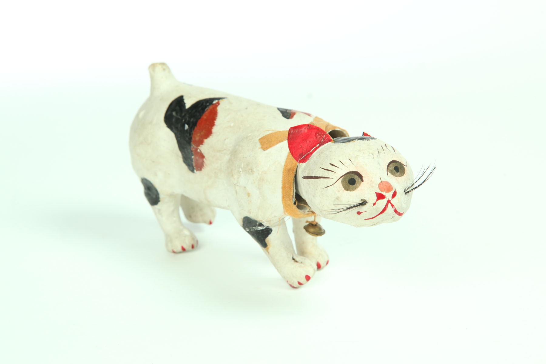 Appraisal: CAT NODDER American nd half- th century papier mache Spotted