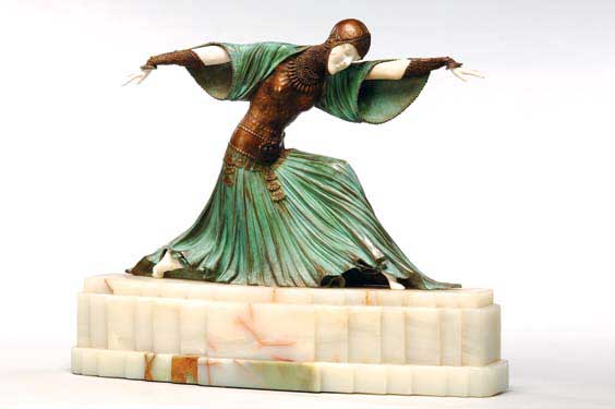 Appraisal: ART DECO STYLE BRONZE AND IVORY Art Deco style dancer