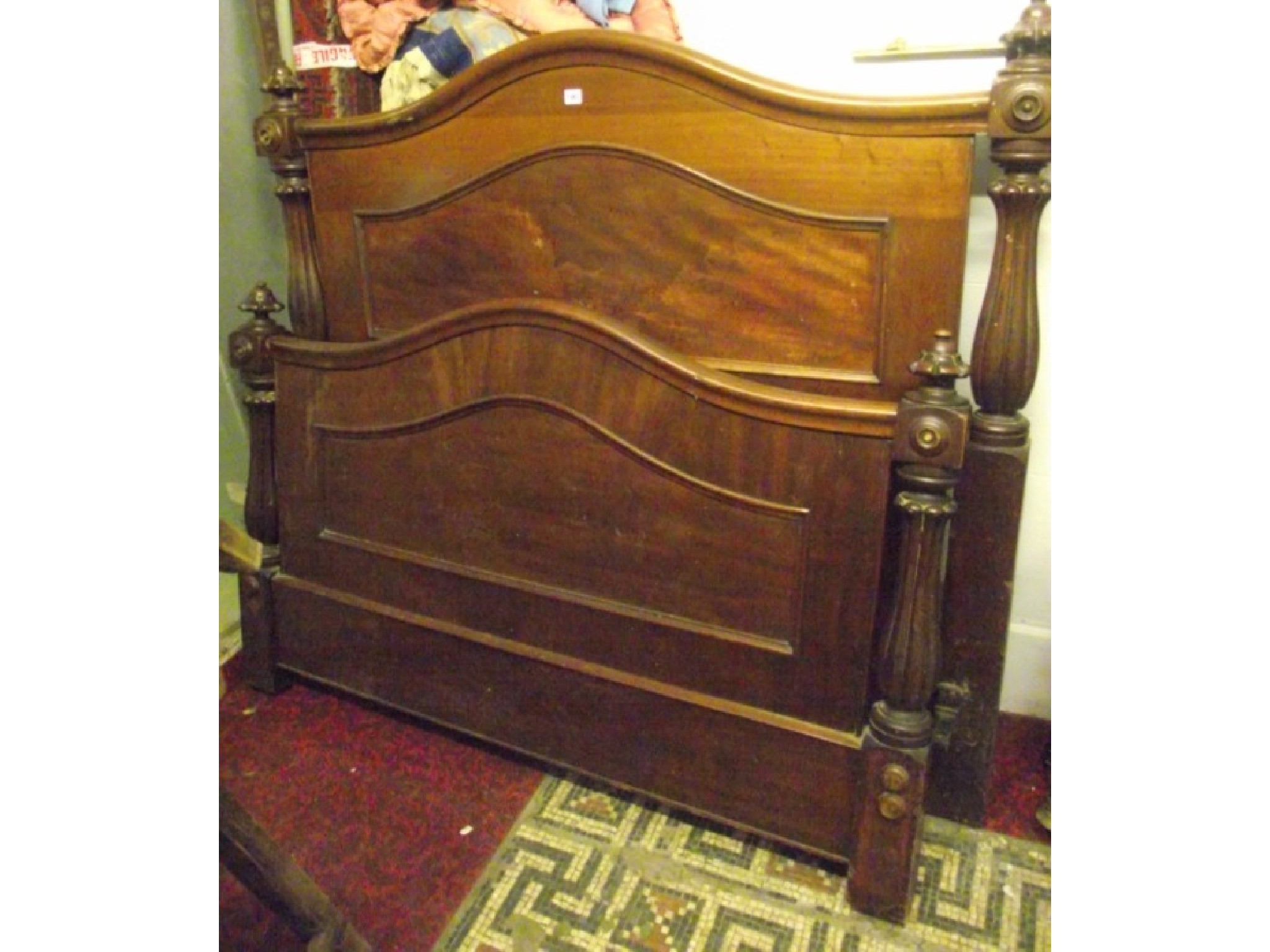 Appraisal: A Victorian mahogany ft double bedstead the arched panelled head