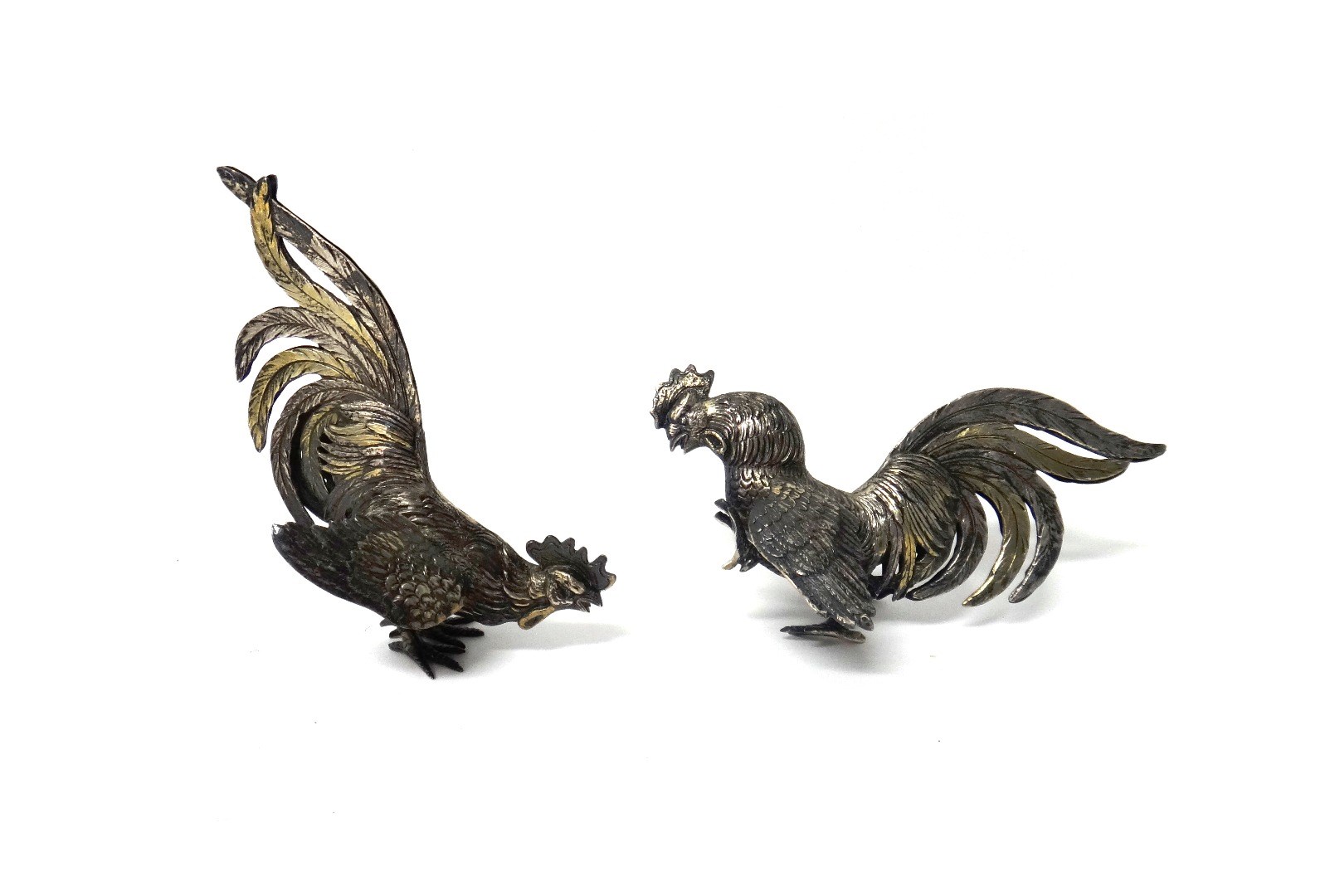 Appraisal: A pair of silver cast models of cockerels bearing import