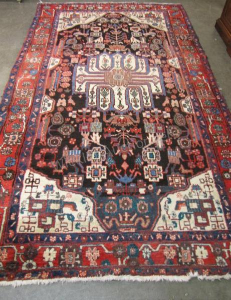 Appraisal: A handmade Oriental room size rug Hamadan design black field