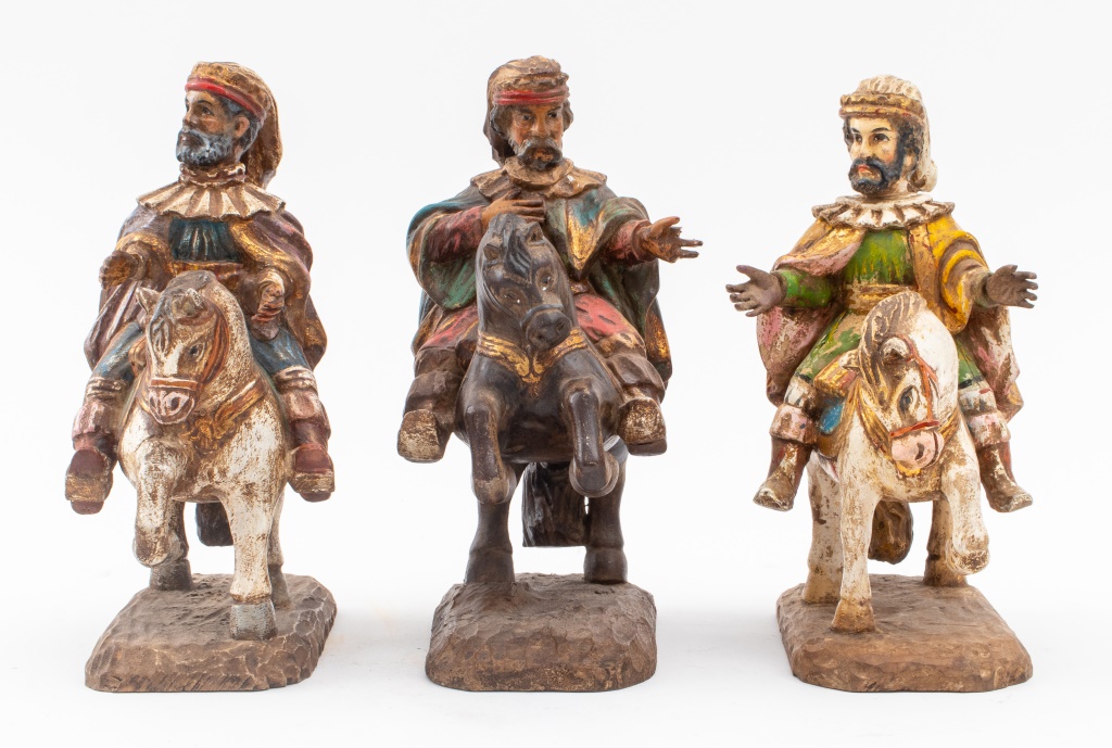 Appraisal: POLYCHROMED WOOD SCULPTURES OF WISE MEN Hand carved and polychromed