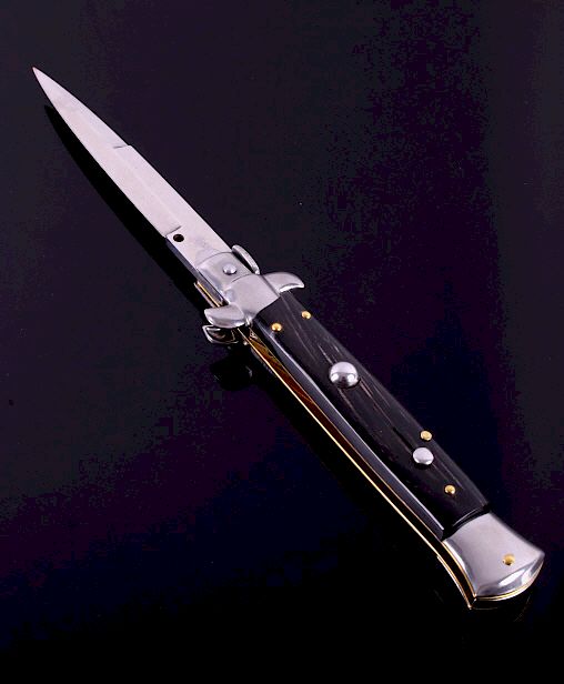 Appraisal: Frank B Italian Stiletto Buffalo Horn Switchblade Included in this