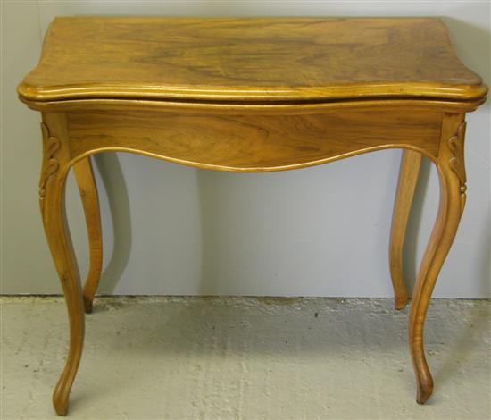 Appraisal: th century walnut serpentine folding card table raised on cabriole