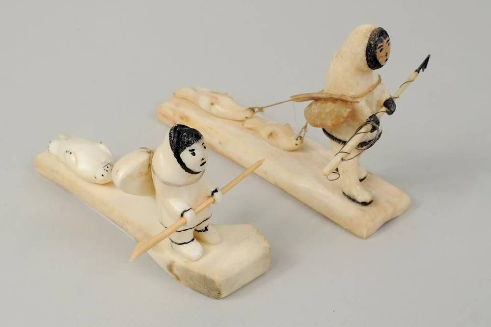 Appraisal: Two Inuit Walrus Ivory Bone Scrimshaw Carvings Two Inuit walrus