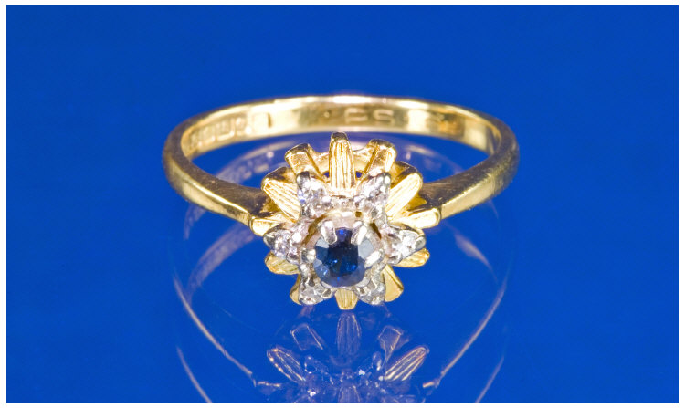 Appraisal: ct Gold Sapphire And Diamond Cluster Ring Central Sapphire Surrounded