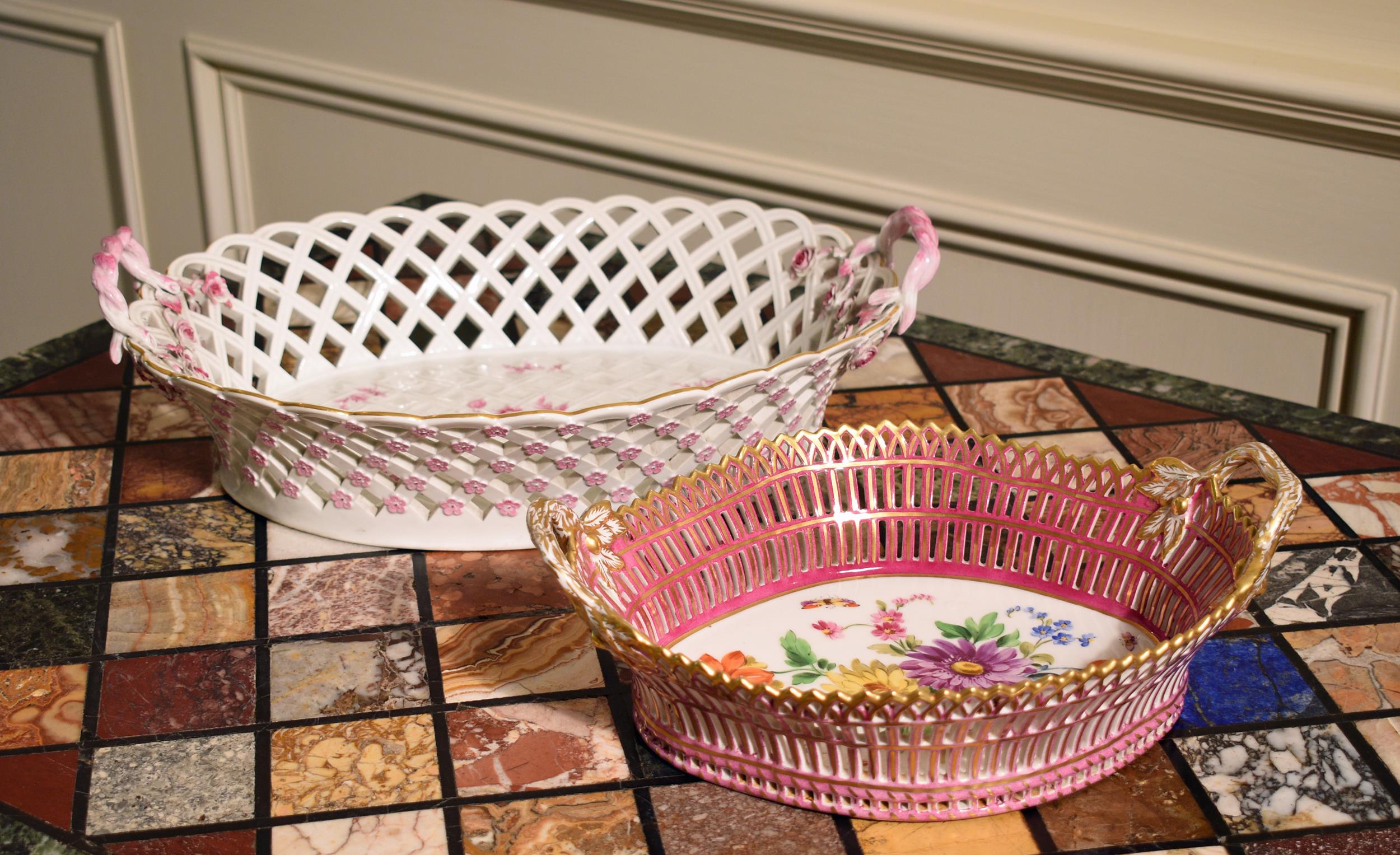 Appraisal: MEISSEN KPM RETICULATED PORCELAIN BASKETS Larger Meissen basket has pink