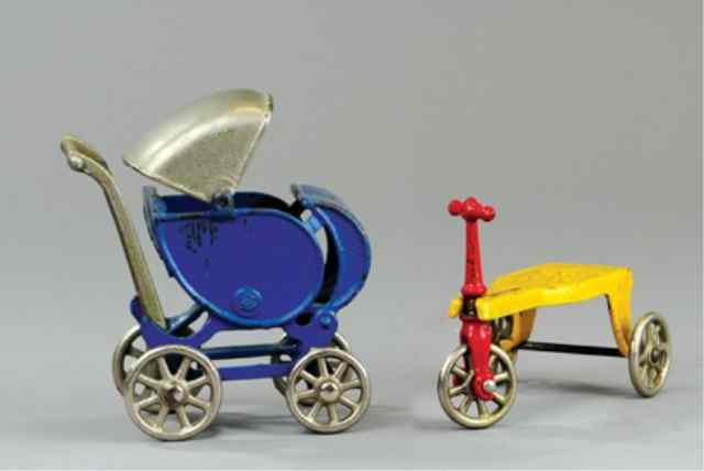 Appraisal: KILGORE CARRIAGE AND CHILD'S KID'S KAR Both cast iron includes