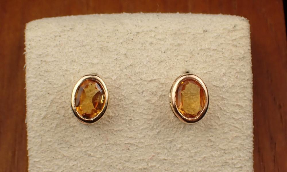 Appraisal: PAIR OF CITRINE AND FOURTEEN KARAT GOLD EAR STUDS each