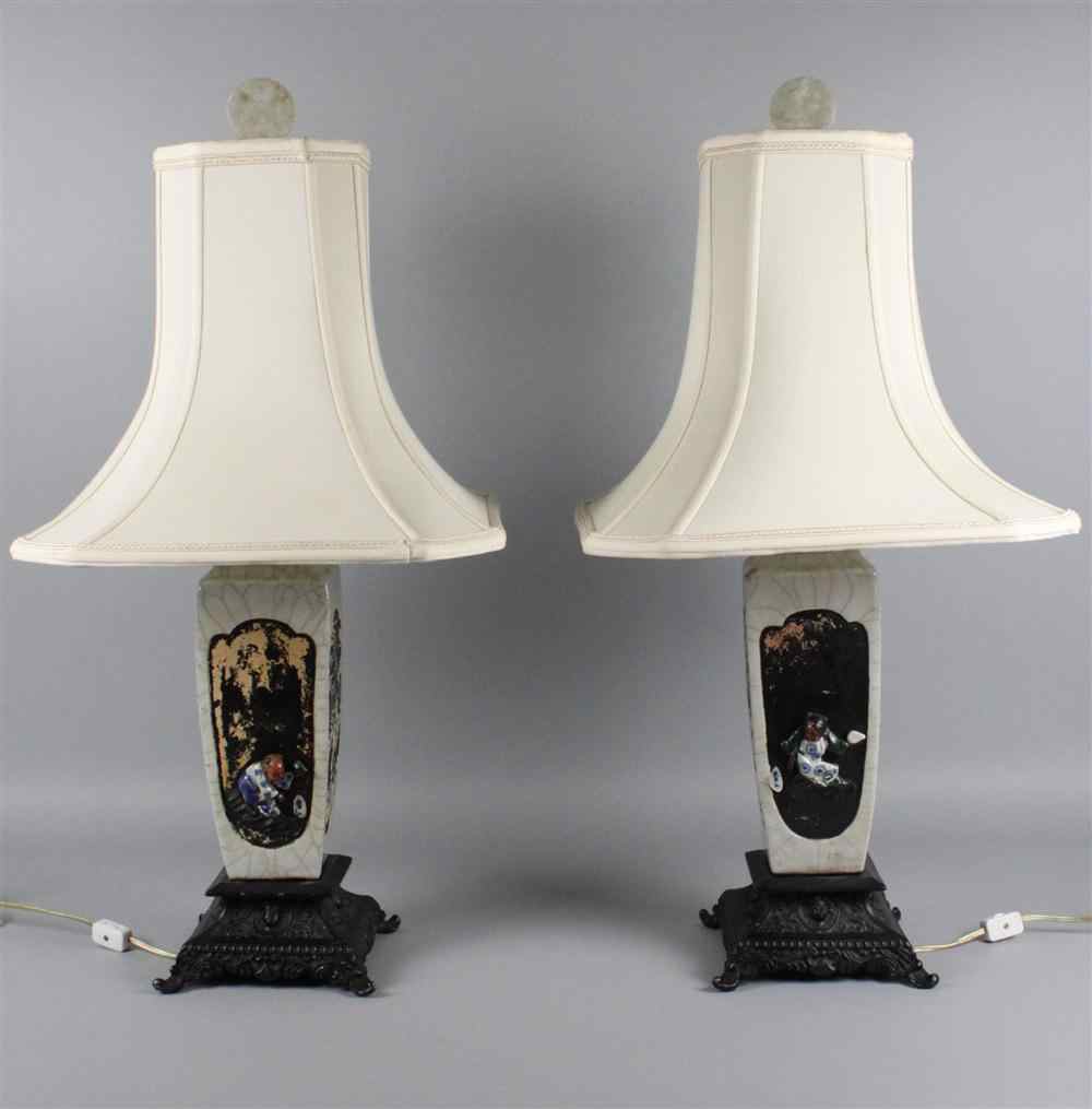 Appraisal: PAIR OF JAPANESE SUMIDA GOWA LAMPS CIRCA featuring a boy