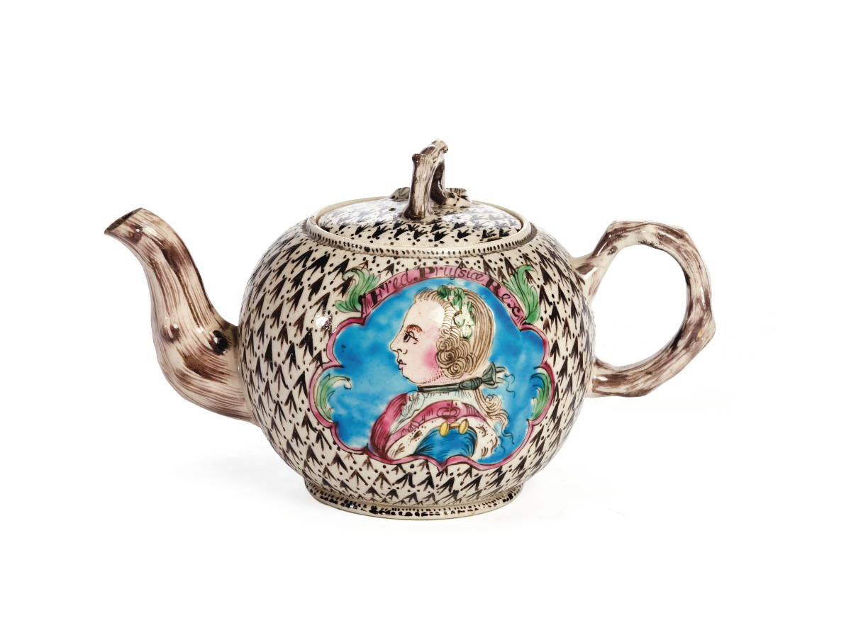 Appraisal: STAFFORDSHIRE SALTGLAZE ENAMEL-DECORATED TEAPOT AND COVER CIRCA - Painted in