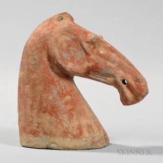 Appraisal: Red-painted Earthenware Horse Head Red-painted Earthenware Horse Head China ht