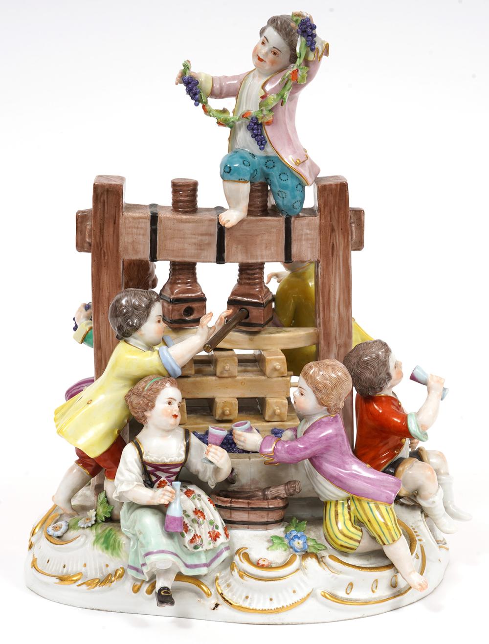 Appraisal: MEISSEN WINTER GROUP WITH WINE PRESSMeissen porcelain with white glaze