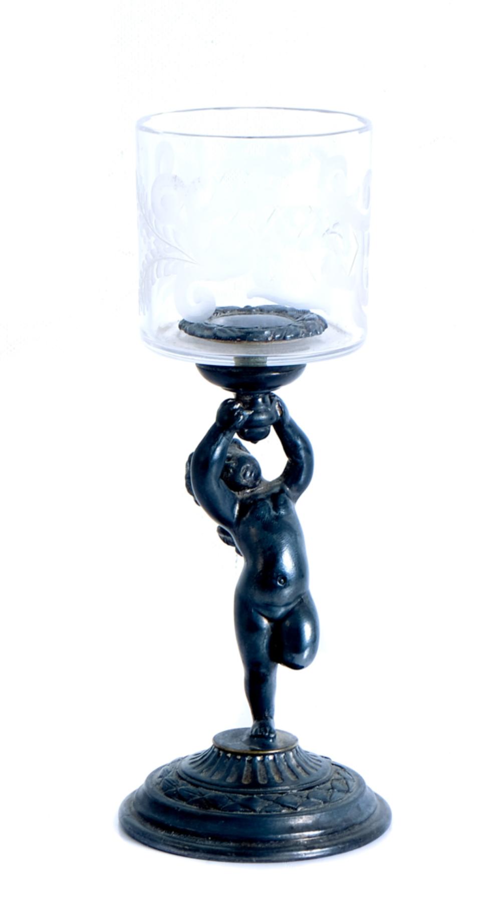 Appraisal: PAIRPOINT FIGURAL PUTTO SILVER GLASS CANDLE STANDPairpoint American found th