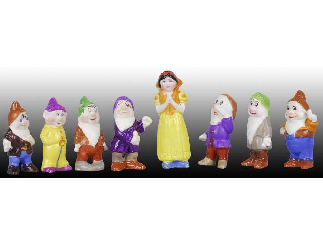 Appraisal: Japanese Walt Disney Snow White Bisque Figures Description Distributed by