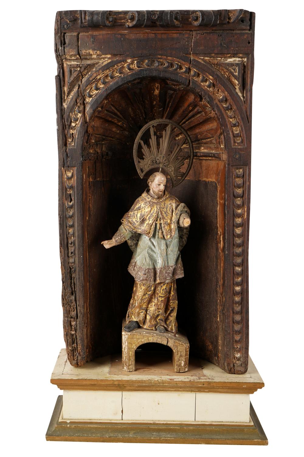 Appraisal: RELIGIOUS FIGURE WITH SHRINEcarved and painted wood the figure with