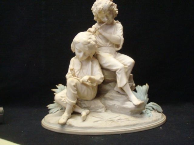 Appraisal: Bisque Figural Grouping Signed Signed on base From a Port