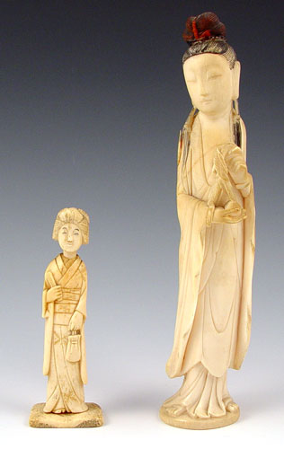 Appraisal: CHINESE CARVED IVORY FIGURES Woman holding fruit and branch unsigned