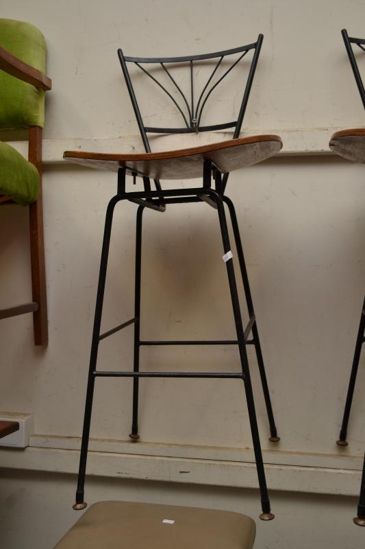 Appraisal: TWO MIDCENTURY WROUGHT IRON BAR STOOLS TWO MIDCENTURY WROUGHT IRON