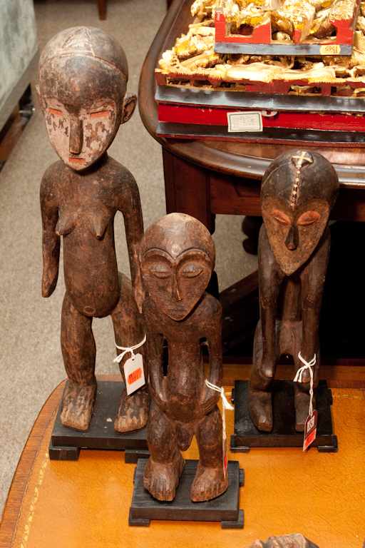 Appraisal: Three African carved wood figures th century tallest is in