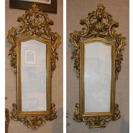 Appraisal: Pair of Italian Rococo Style Gilt-Wood Mirrors Estimate -