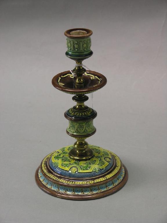 Appraisal: A Victorian Doulton Lambeth majolica candlestick columnar stem with brass