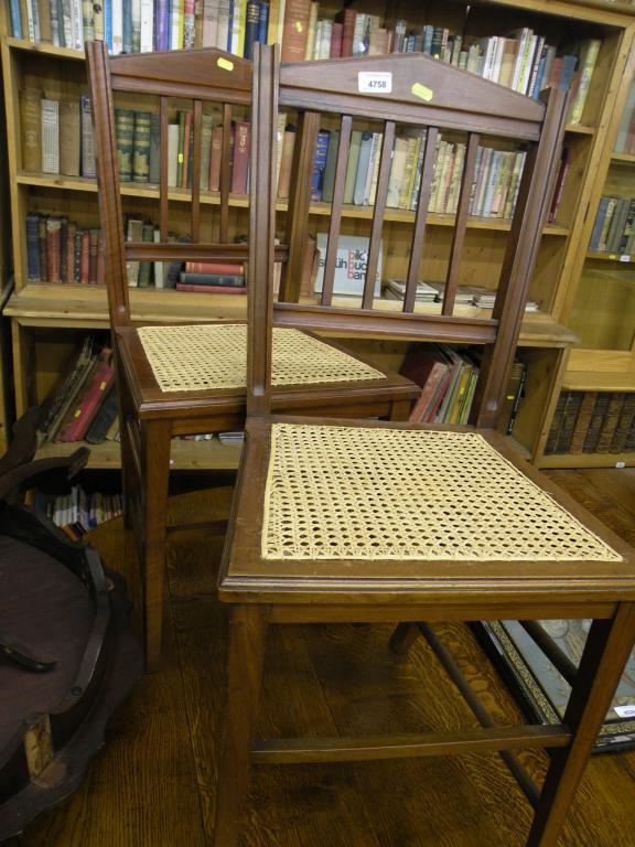 Appraisal: A pair of Edwardian walnut bedroom chairs