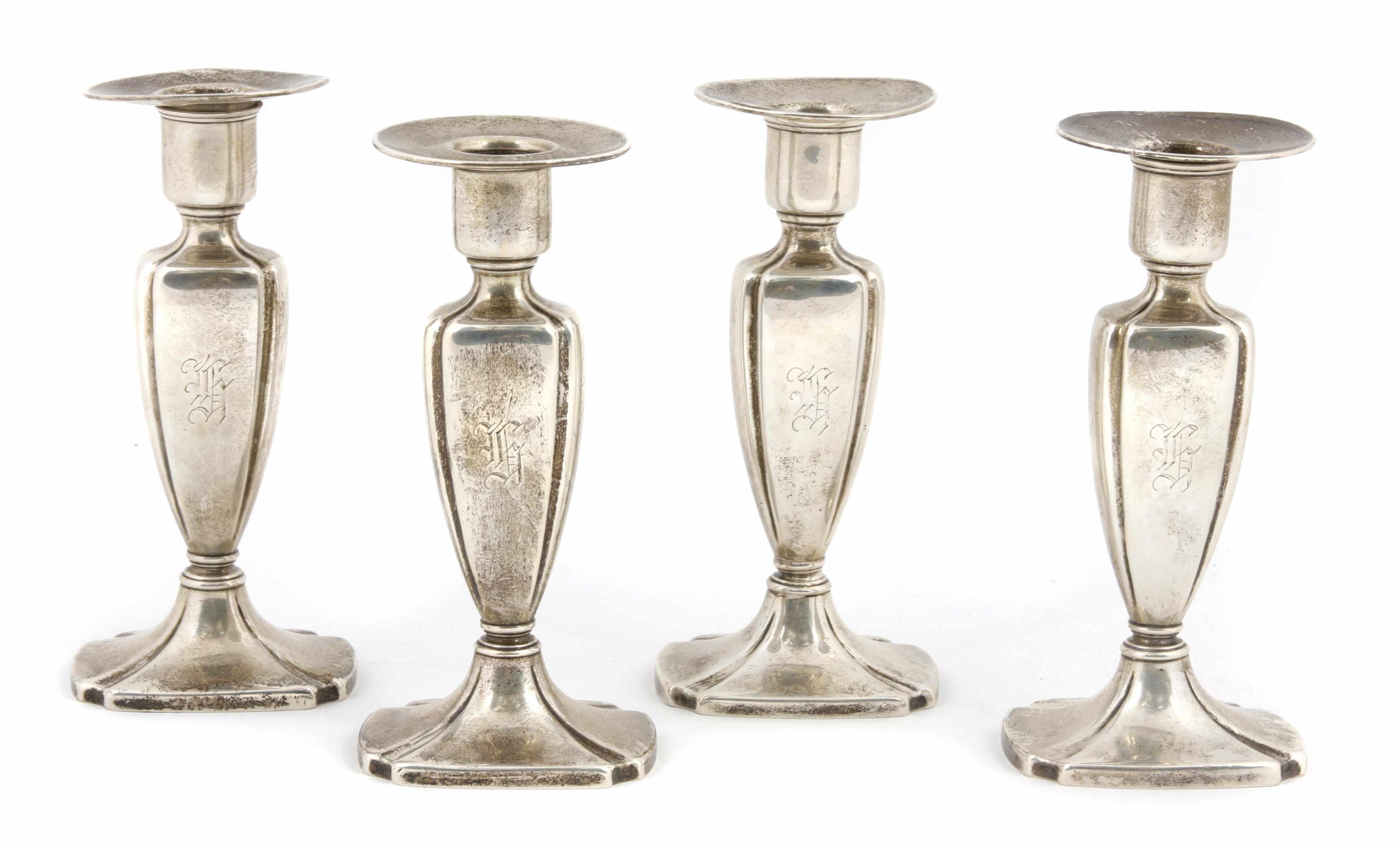 Appraisal: A set of four American sterling silver candlesticks Whiting Mfg