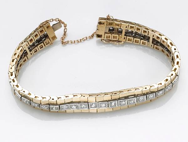 Appraisal: A diamond and fourteen karat bicolor gold line bracelet estimated