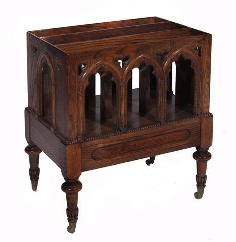 Appraisal: A GOTHIC OAK THREE DIVISIONAL CANTERBURY with arched sides one