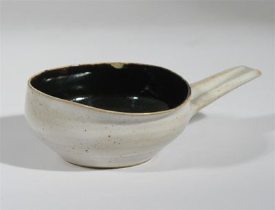 Appraisal: A stoneware pouring vessel by Lucie Rie and Hans Coper