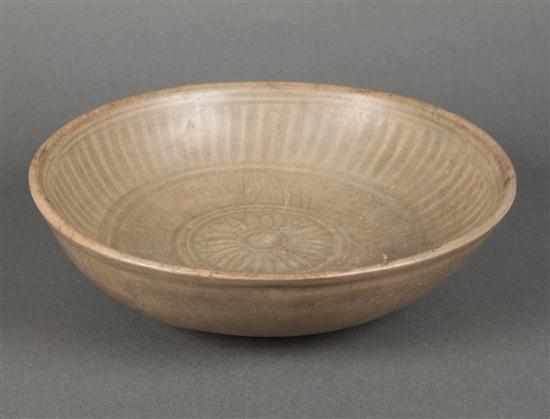 Appraisal: Thai Sawankalok incised stoneware bowl with celadon glaze th century