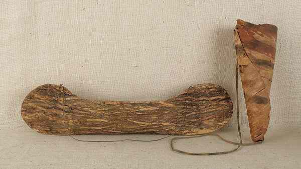 Appraisal: Miniature bark canoe together with a bark moose horn canoe