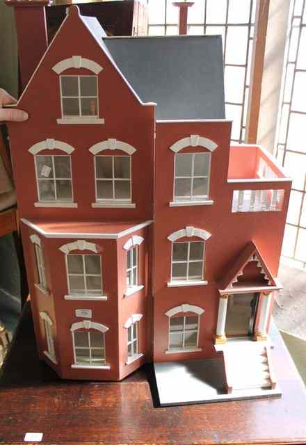 Appraisal: A MODERN DOLL'S HOUSE in the form of a Georgian