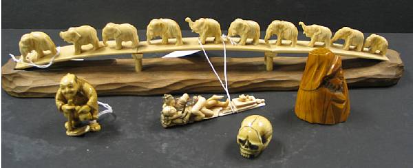 Appraisal: Four Asian ivory carvings Including a Japanese ivory skull a