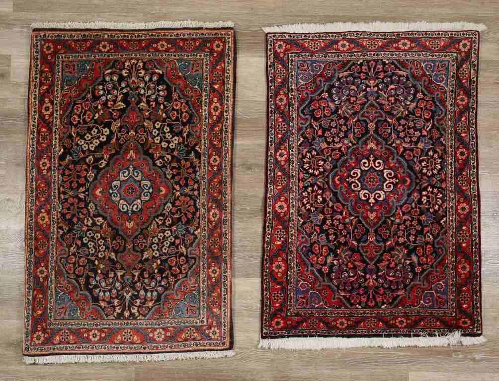 Appraisal: Pair of Persian rugs Each ' x ' Fading discoloration