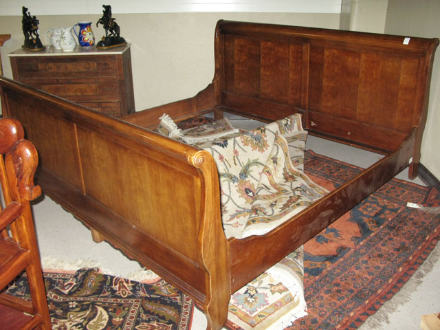 Appraisal: MAHOGANY KING BED WITH RAILS American Empire style sleigh design