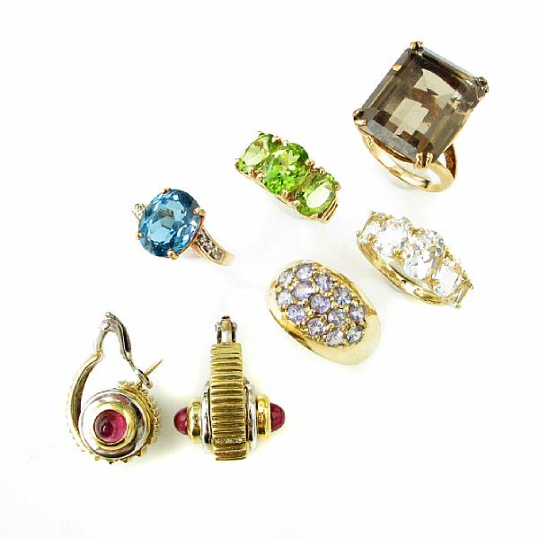 Appraisal: A collection of gemstone and gold jewelry featuring five rings